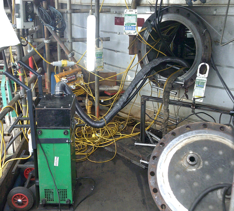 Carousel 1 - Efficient mobile welding fume extraction system in use inside a confined space 1