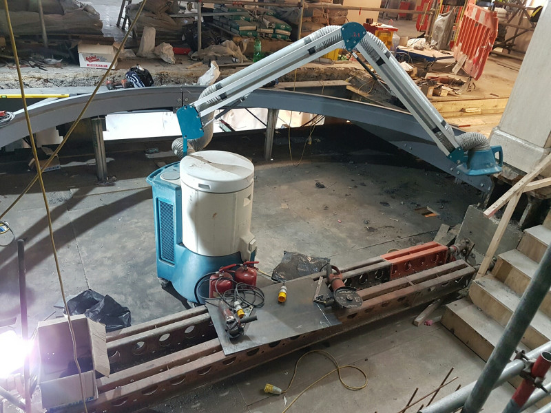 Carousel 3 - RVT Group_s mobile welding fume filter positioned next to a work bench to create a welding fume station_