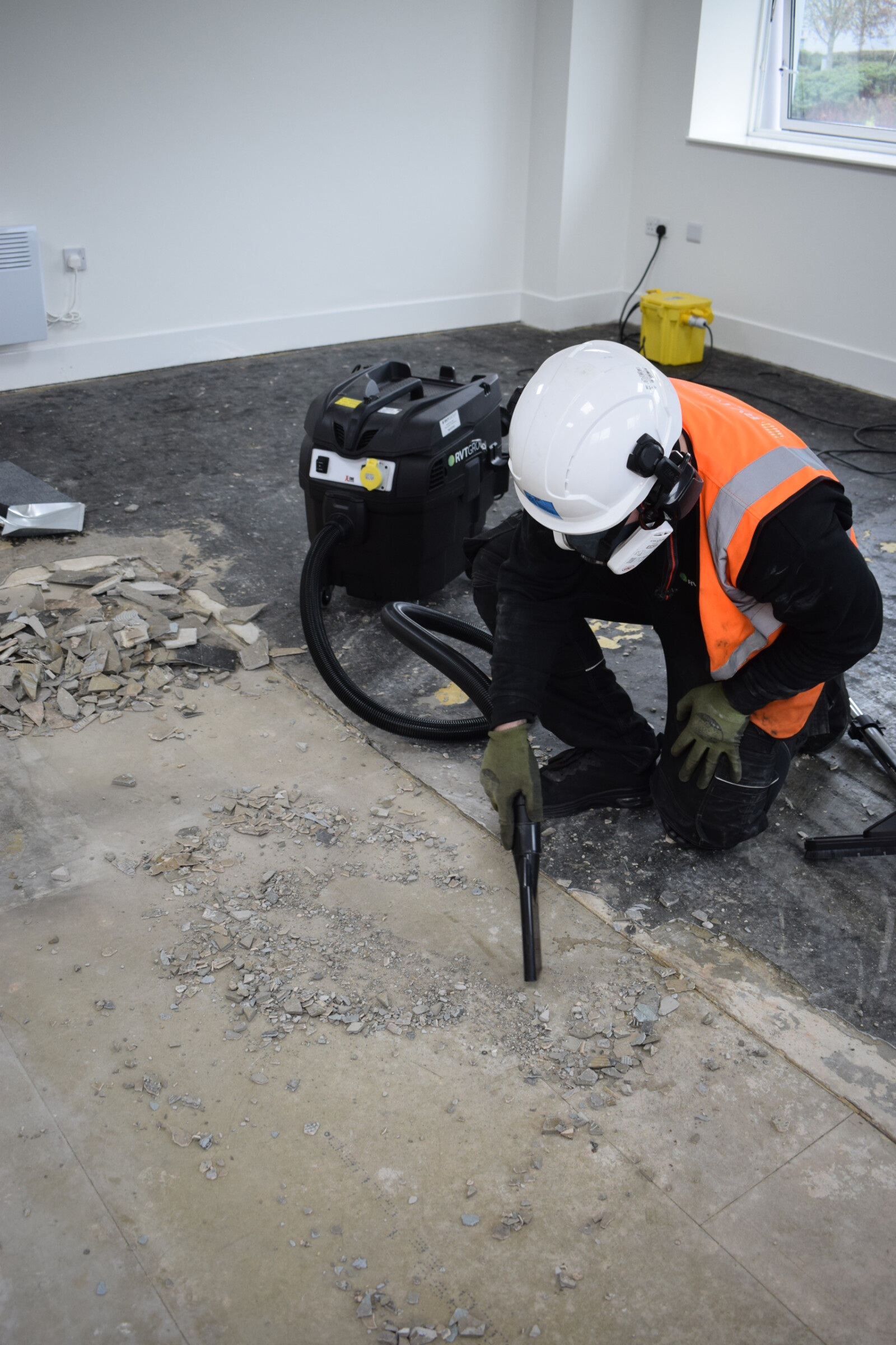 Dustex B4 vacuum and attachments in use during office refurbishment