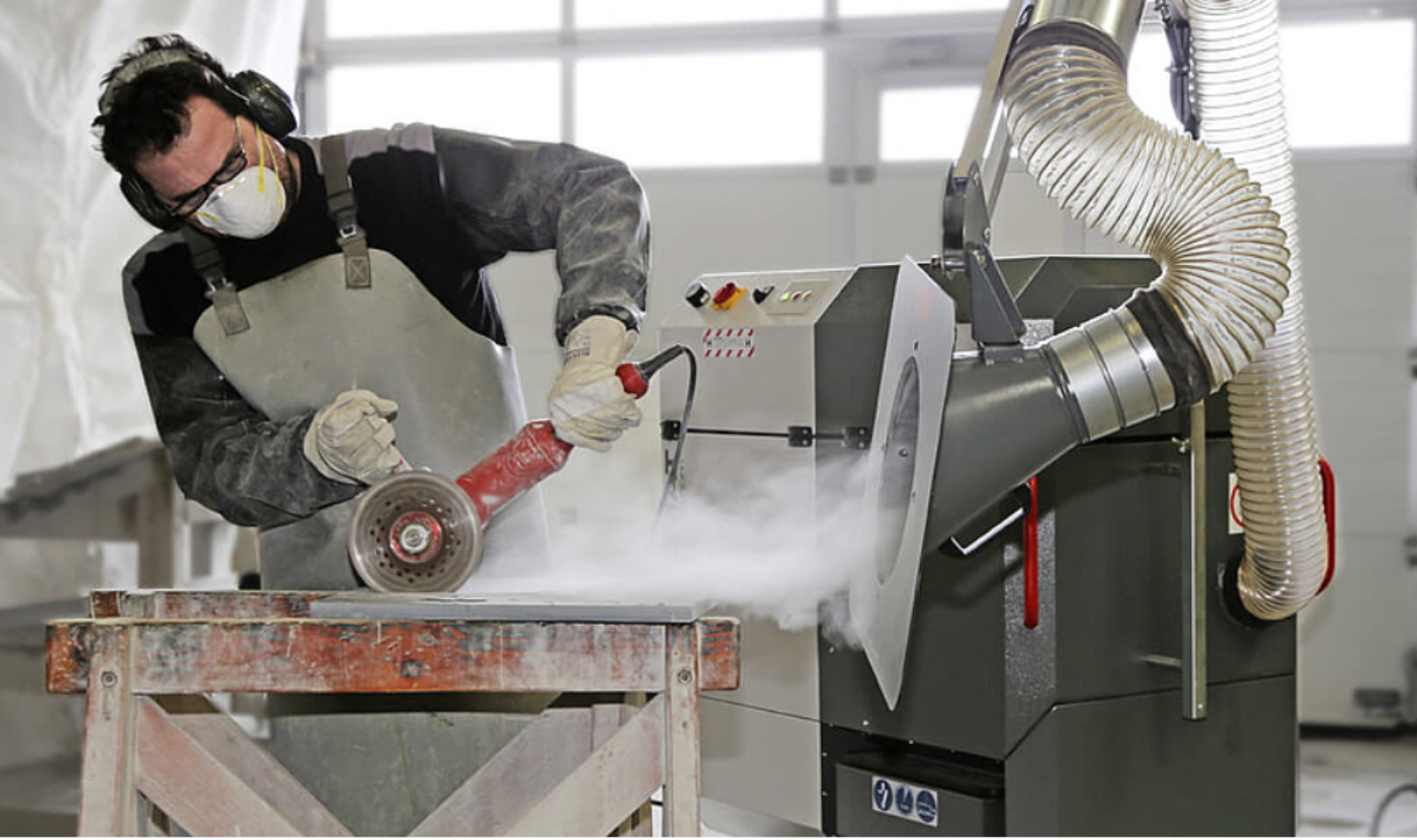 Dustex D4 extracting dust from a live work station