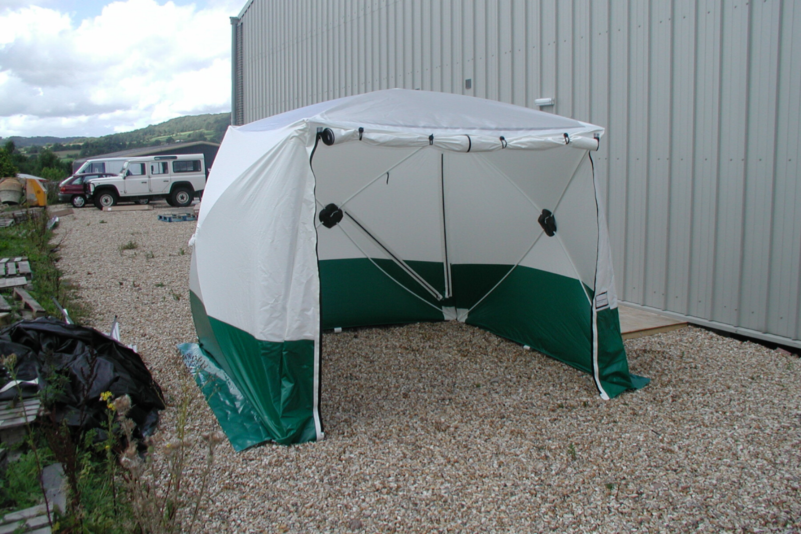 Dustex Pop Up Tent with door open ready to be used as a work station for potentially dusty works such as cutting and sanding