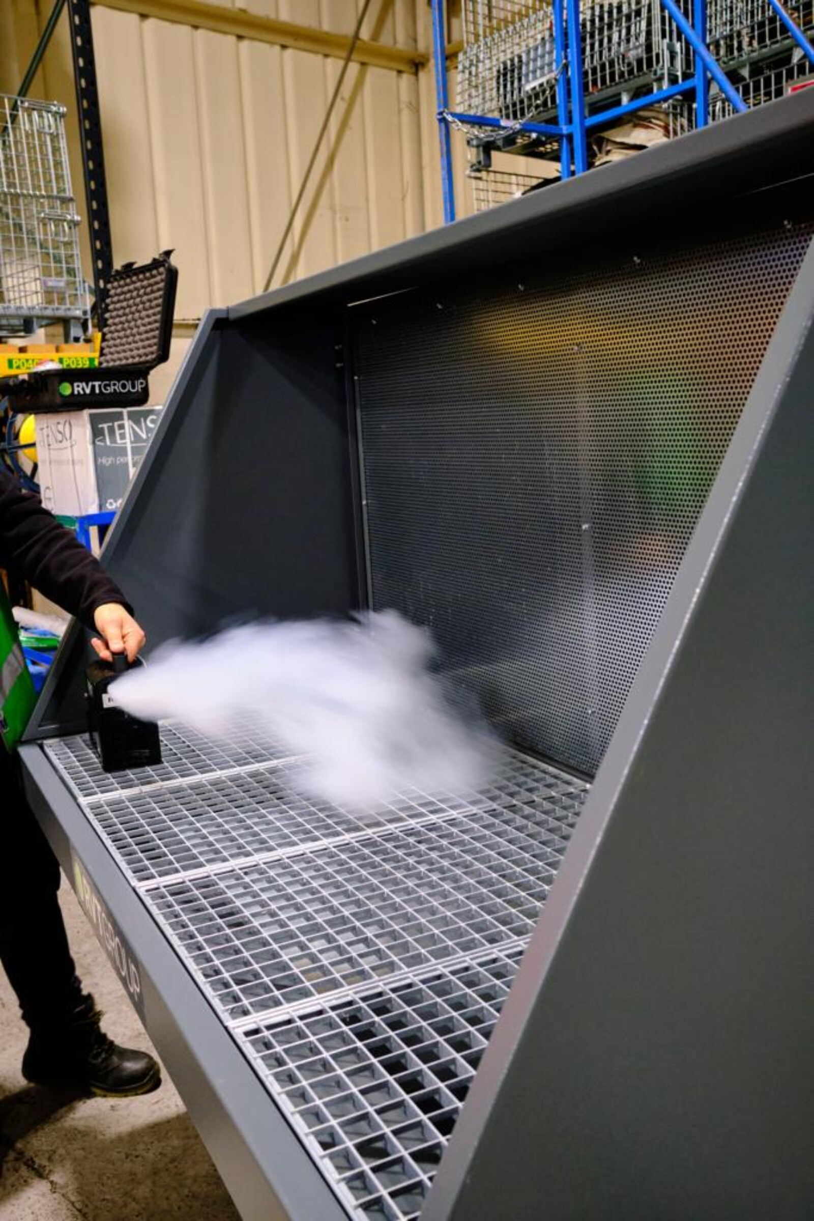 Dustex downdraft bench dust extraction being tested with a smoke machine
