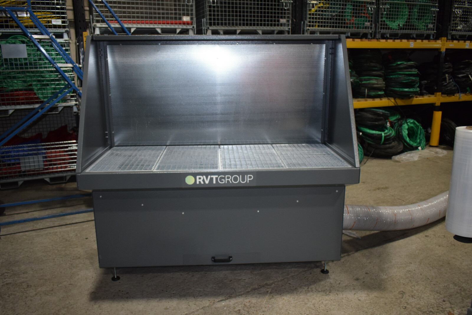 Dustex downdraft bench set up in a warehouse ready for dust and fume extraction