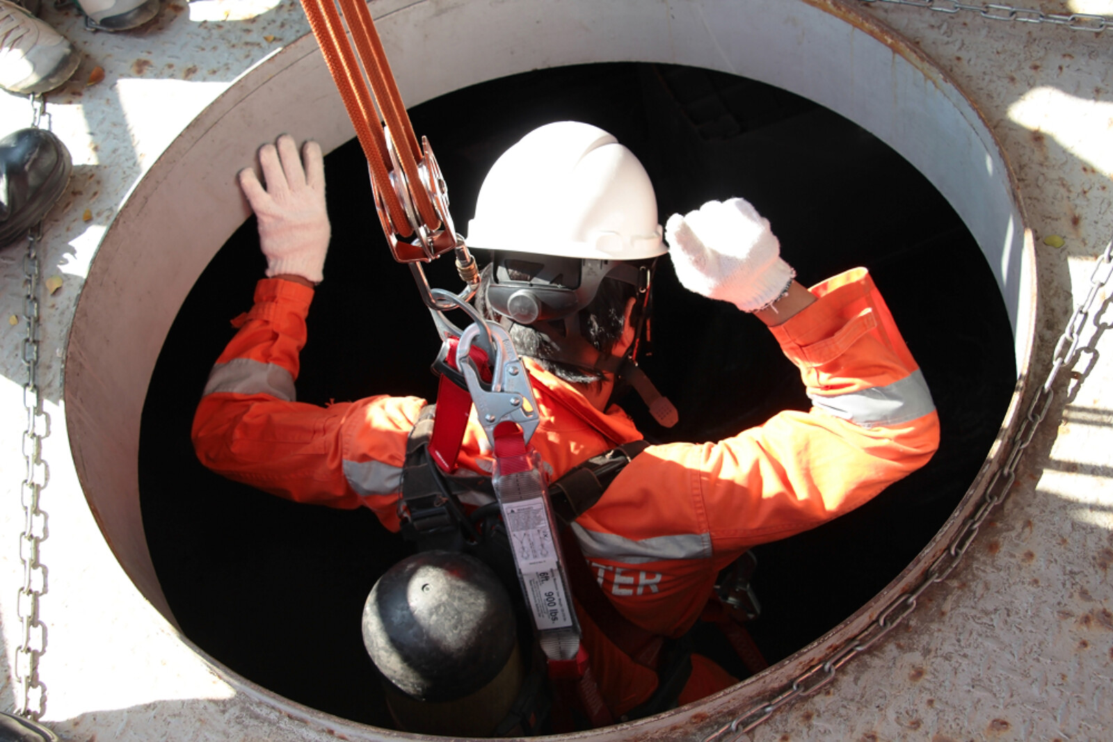 Site Worker Entering Confined Space 1