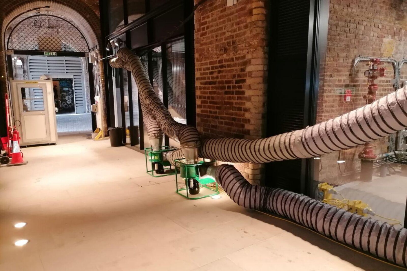 2 VENTEX® Centrifugal Fan 200P forcing fresh air into two store fronts at borough market