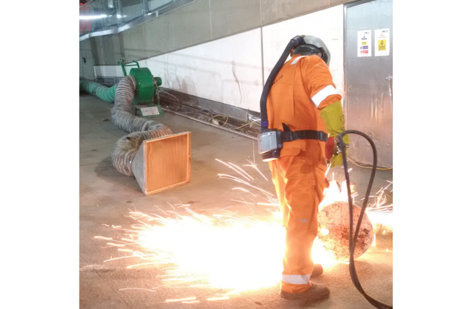 Capture hood with inbuilt filter media capturing fumes from hot works