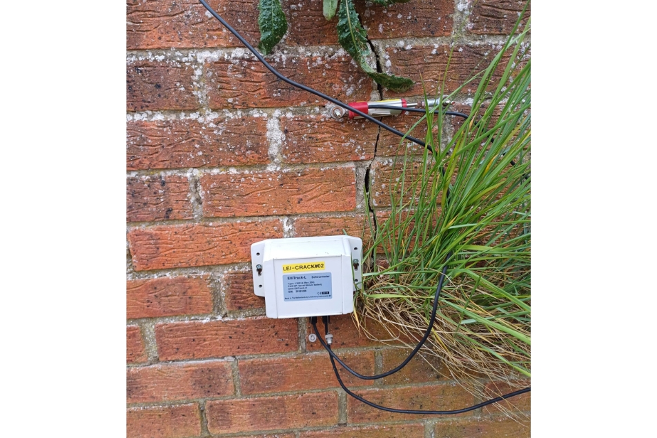 Crack monitor in place on external wall