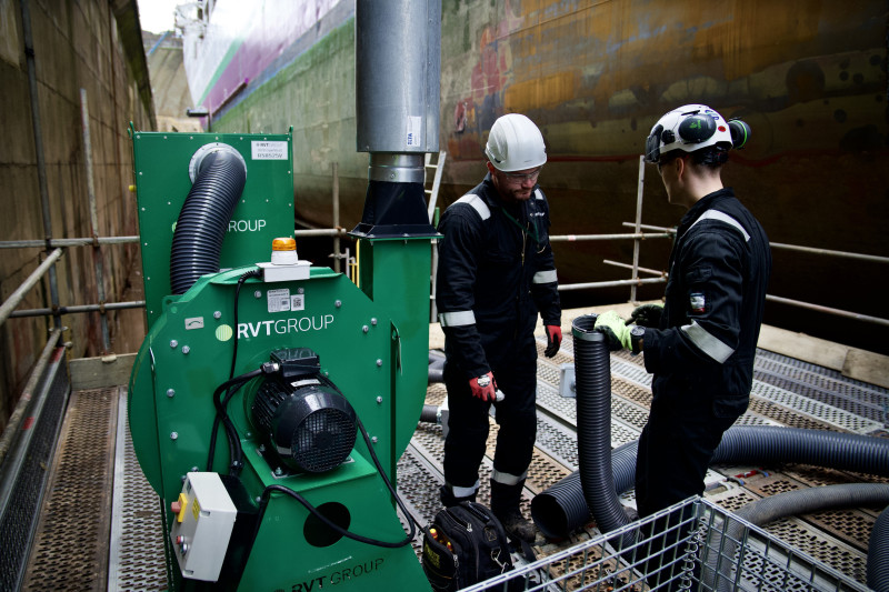 Two RVT colleagues installing ducting