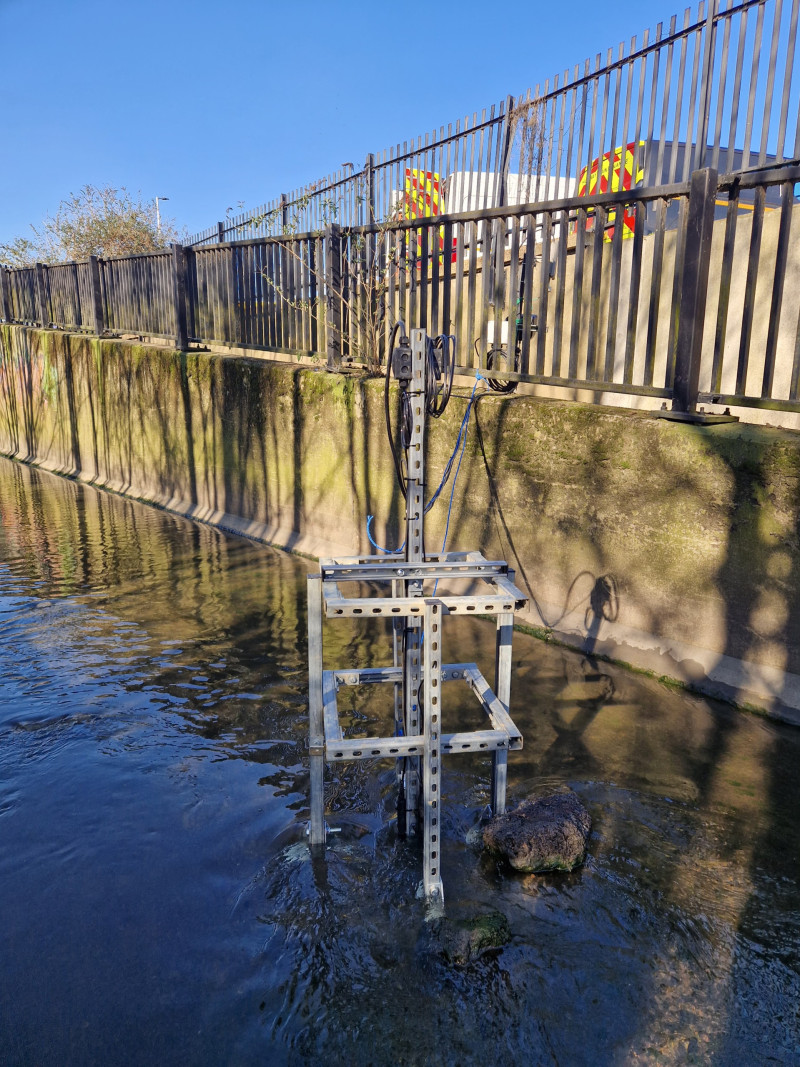 EnviroHub-In-Stream-Monitor-taking-measurements-from-a-stream-in-London-scaled