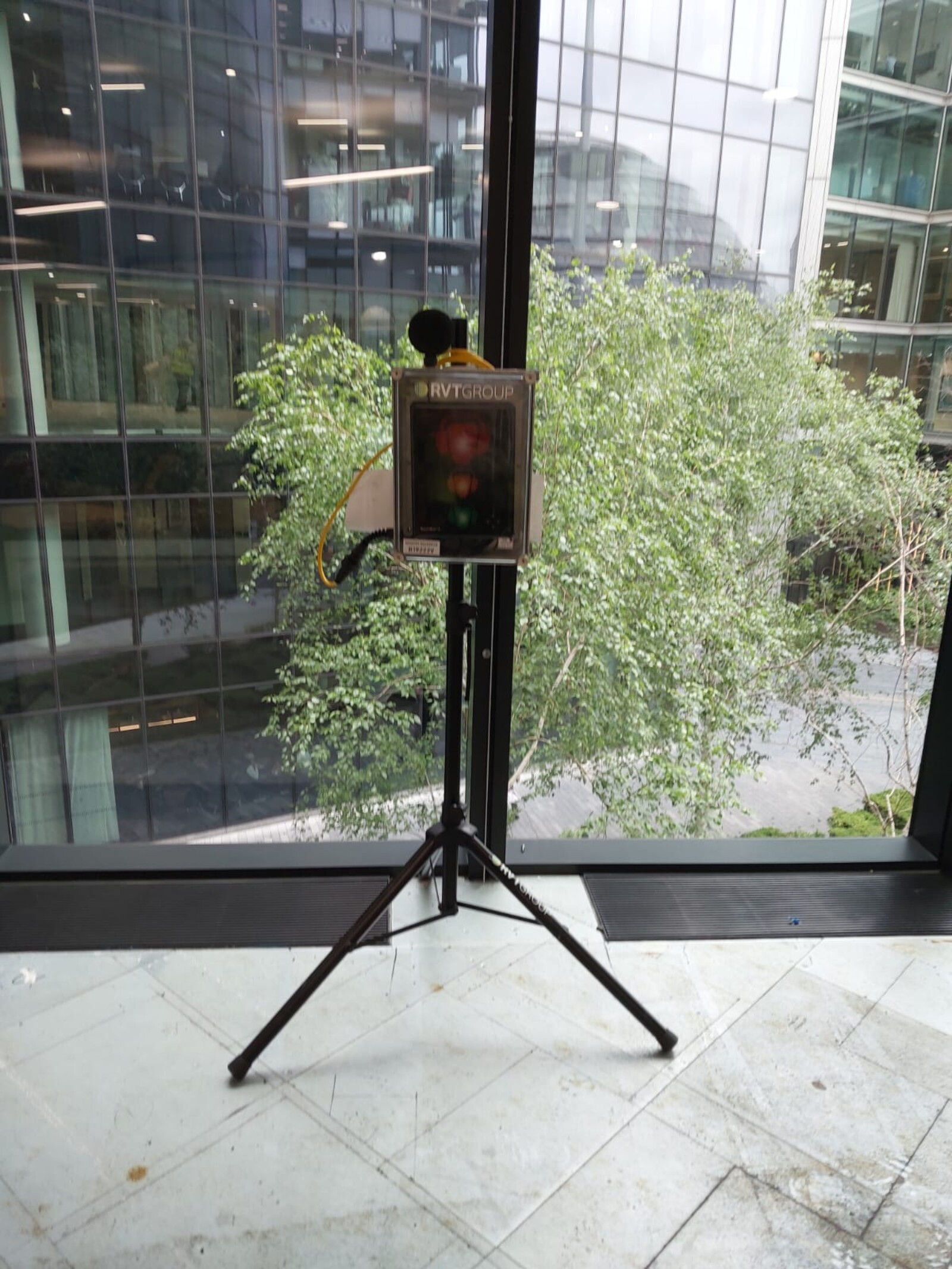 MONITEX Portable Noise Level Warning System next to a window whilst refurb works take place