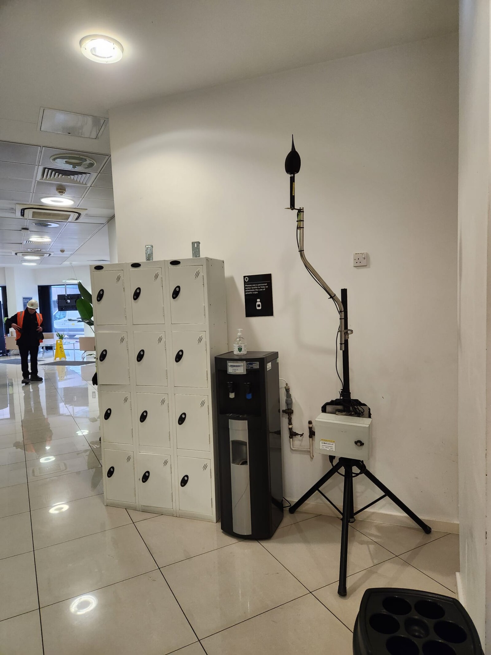 Monitex Area noise monitor next to a set of lockers in a University reception area
