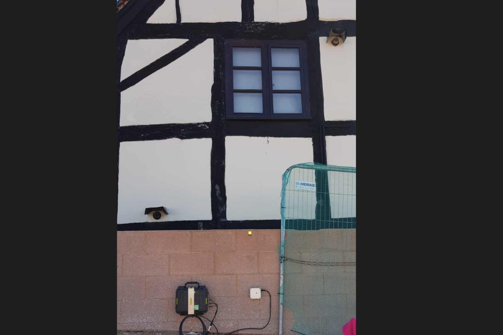 Monitex vibration monitor mounted on a tudor house