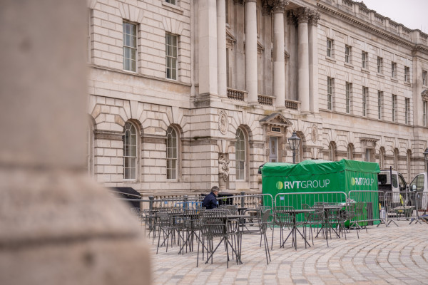 Noise enclosure surrounding pipe work