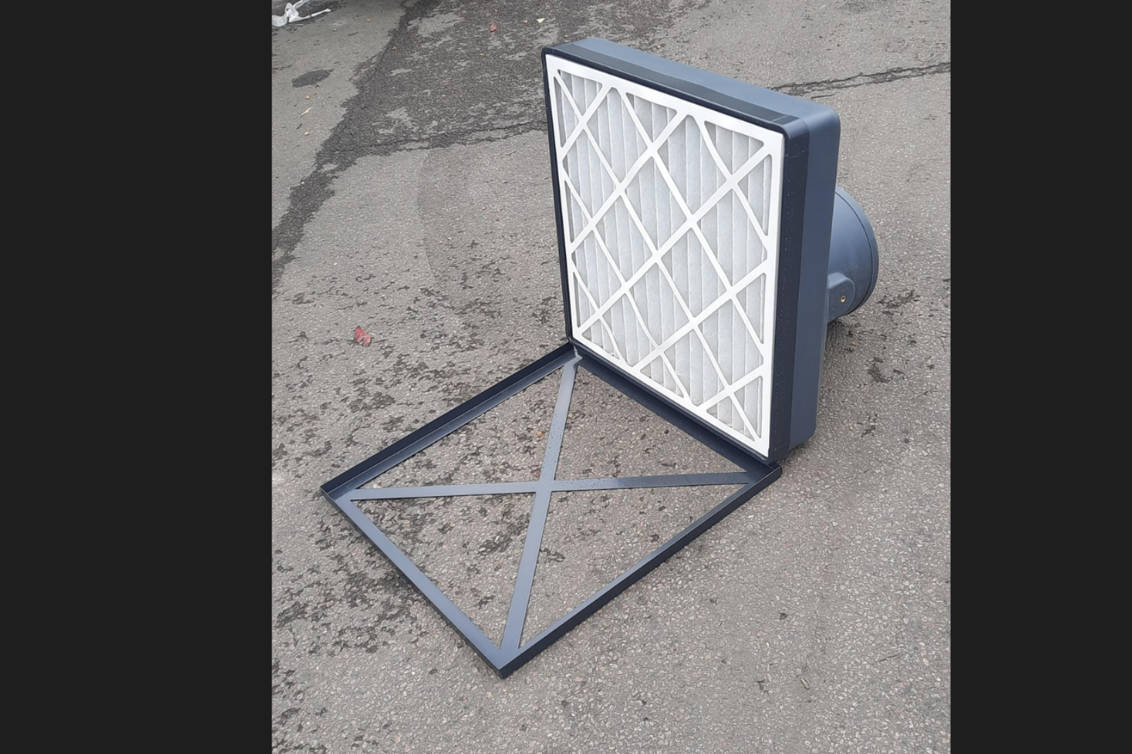 Plastic capture hood with filter media inside and front attachment taken off
