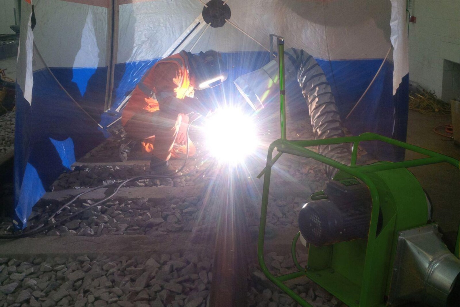 VENTEX Centrifugal Fan 200P assisting fume extraction whilst a welder carries out welding in an enclosed area