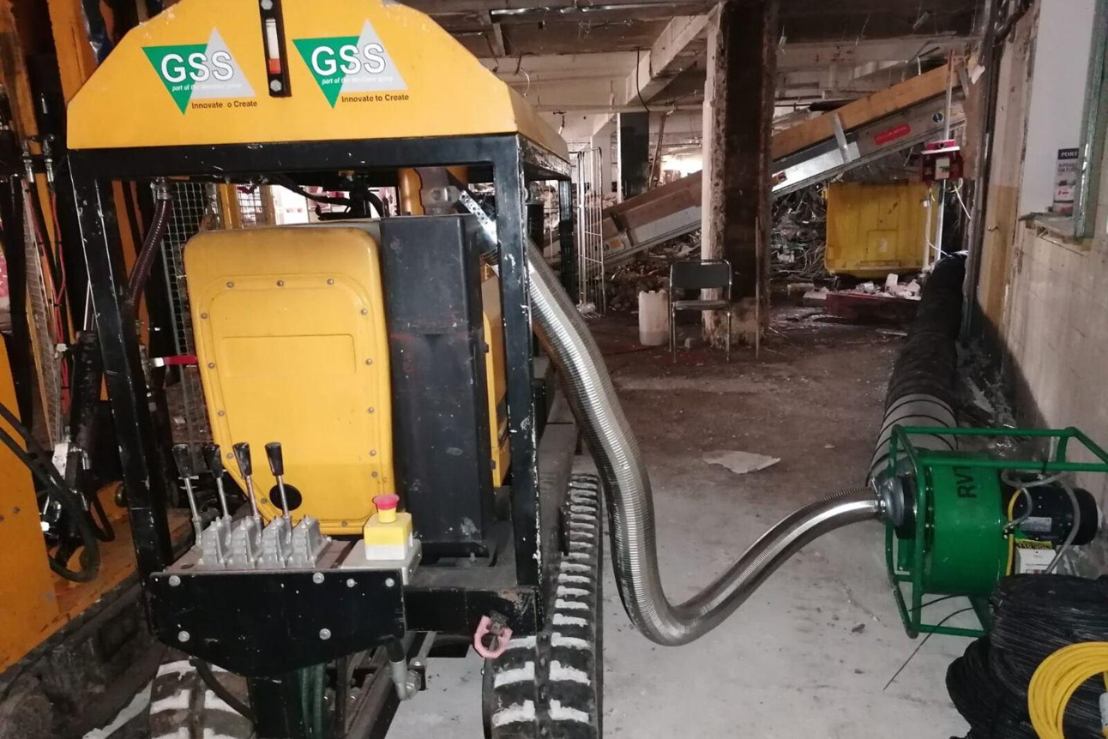 VENTEX® Centrifugal Fan 200P aiding exhaust fume extraction from a small digger