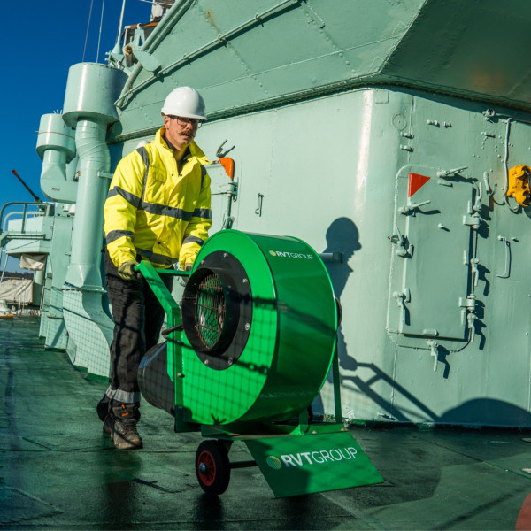 RVT Group installer wheeling the 300M fan onboard a naval ship.