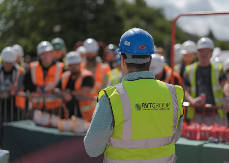 RVT group consultant presenting on a sunny construction site about Industrial Cooling Solutions