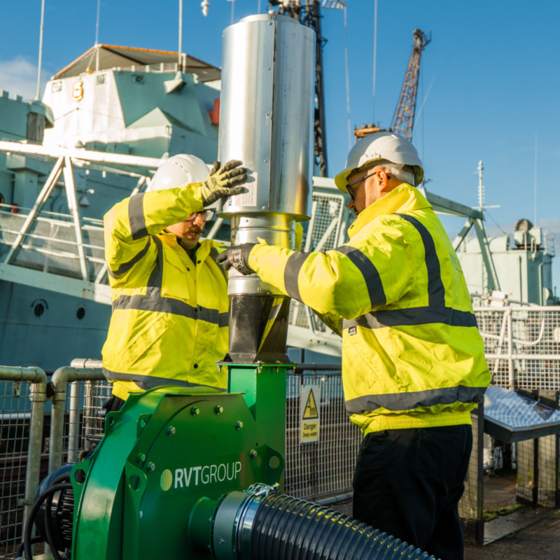 Engineers installing equipment to site