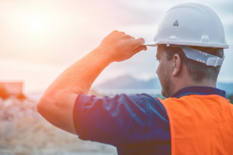 construction worker looking over site