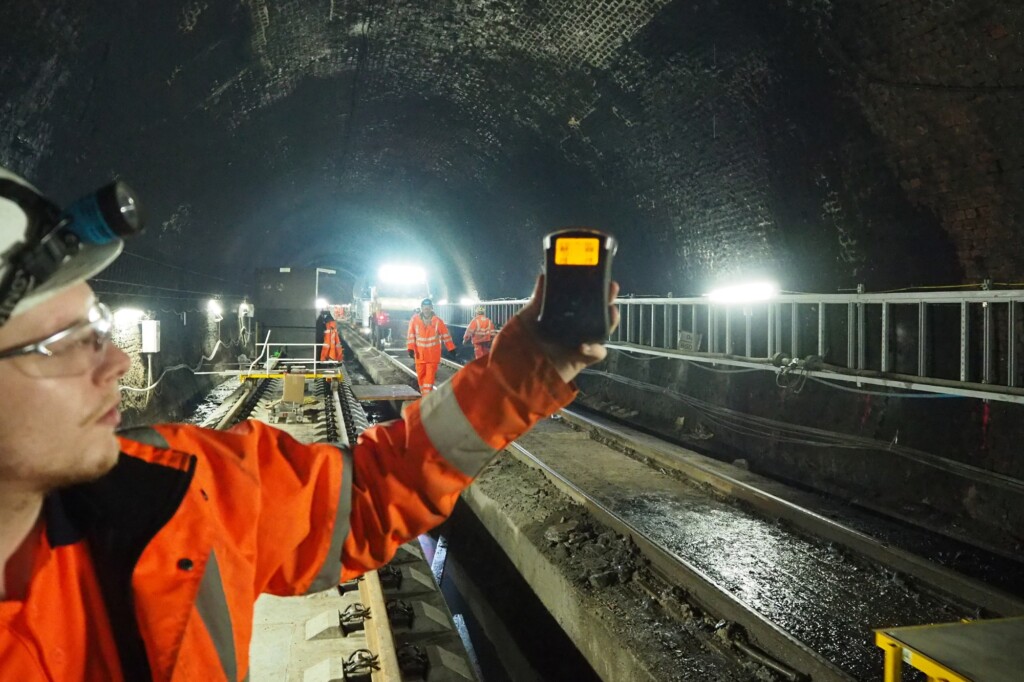engineer carrying out monitoring in rail tunnel