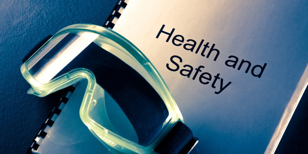 health and safety booklet and goggles