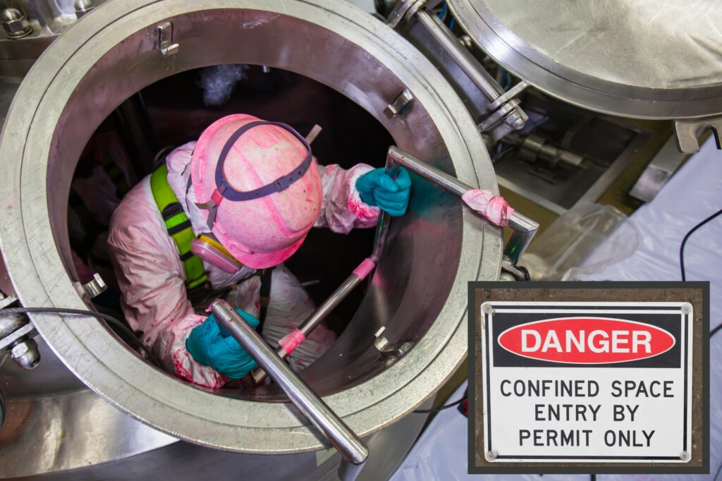 workman with visible paint on overalls entering confined space with danger sign