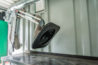 Interior: RAVEX® Welding Control Container – workbench and extraction arm